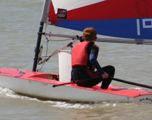 The youngest sailor on the water, and star of the event, Finley Taylor drives his Topper round the course for the Potterers Pot