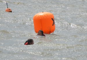 Poppy swims out to the buoy