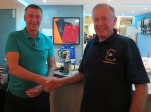Chairman of Directors Malcolm Jolly presents John Tappenden with the Tee Dee Trophy