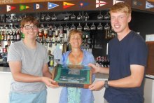 Tom and Finlay - the "Two Salty Nuts" are presented with the Splash Winners Trophy by Cadet Officer Claire Aylen
