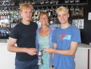 A proud mother presents her sons, Ross and Caleb, with the runners-up trophy - better luck next time boys