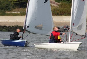Peter Downer, in his Comet, hot on the heels of Tom Philpot's Laser early on in the Gunfleet's final race of the Autumn Series