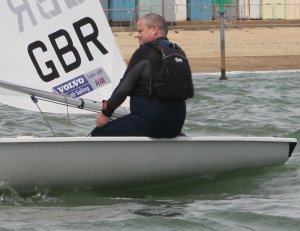 Paul Stanton takes his Laser to victory after a hard fought sail against his competitors