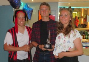 Owen and Francesca are presented with the Amazon Trophy for the first Topaz 