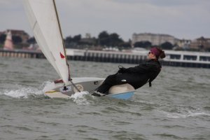 Clare Giles beating in her Europe as she heads from Seaward to the Eastcliff buoy