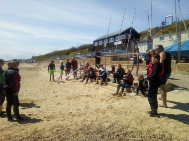 The Cadets and Otters are briefed before the Afternoon Sunday Sailing 