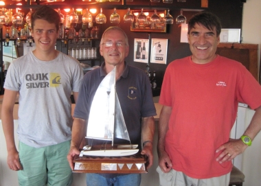 Father and Son Larry and James Foxon, from Clacton Sailing Club, being presented with the magnificent David Foster Catamaran Challenge Trophy for taking their Hurricane to victory in the afternoon