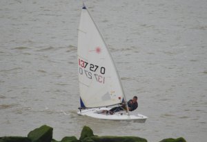 Ken Potts leads the dinghies home