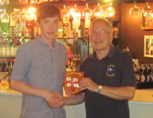 James Stacey is presented with the RNLI Shield for first Cadet - he was second overall in his Spitfire 