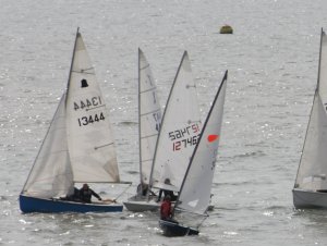 Peter Downer heads along the line in his Comet, defying the other boats at the start of the race