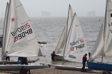 Competitors prepare their boats before the start