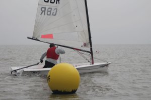 Dave Ingle rounds the downwind Kingscliff mark