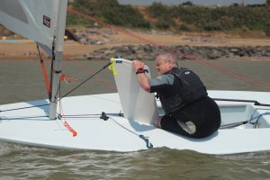 Paul Stanton sails by the lee in an attempt to overtake Brian Allen