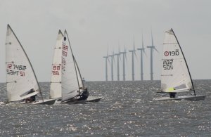 John Tappenden leads the way, whilst Simon Clarke catches out the Lasers, heading out to sea in his Europe