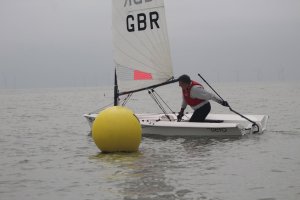 Dave Ingle cuts round the buoy in his RS Aero during the race for the Ken Dye Cup