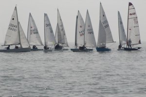 Boats cluster at the line for the second attempted start in the first Autumn Series Race