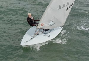 Andy Dunnett in his Laser claims fourth place 