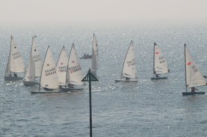 The sun sparkles on the water at the start of the second race for the Tee Dee Trophy