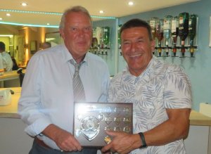 Bob Moss presents Ken Potts with the 2022 Winter Series Trophy