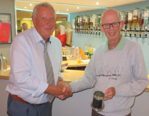Winner of the Comet Class Points - Keith Lamdin collects his trophy