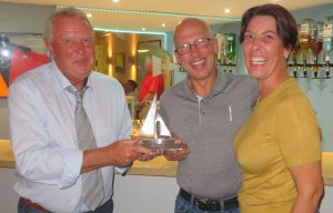 Simon and Nicky Kedge are presented with the Personal PY Trophy by Bob