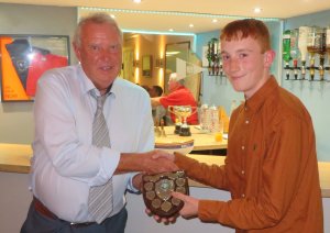 Bob presents the Junior Leading Helm to Finley Taylor