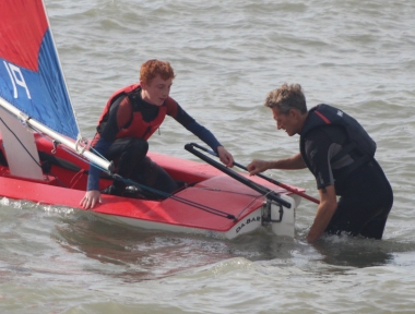 The two winners - Jono Dunnett helps Finley Taylor to launch his Topper