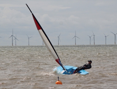 Adam Kedge takes his boat to victory in the Topper Class Points race