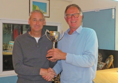 Vice Commodore Robert Mitchell presents Tim Dye with the Toppo Single Helm Trophy