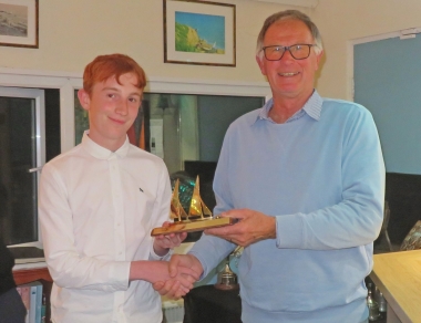 Cadet Finley Taylor is presented with the Personal PY Pursuit Race Trophy