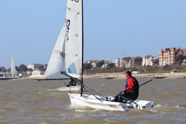 Ken Potts in his RS Aero passes Adam Kedge's Laser