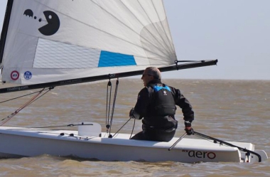 Derroll Pedder, after a few capsizes, drives his RS Aero into third place