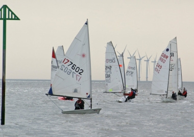 Competitors hover on the line, preparing for the start