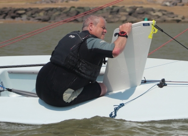 Paul Stanton sails his Laser by the lee as runs to the Outer Distance Mark