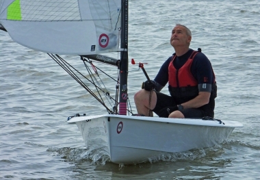 Tim Dye concentrates on his sail shape in his RS Aero