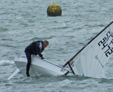 Brian Allen righting his RS Aero out by the Seaward buoy