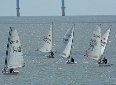 The leading dinghies on the run from Seaward to the AWS buoy