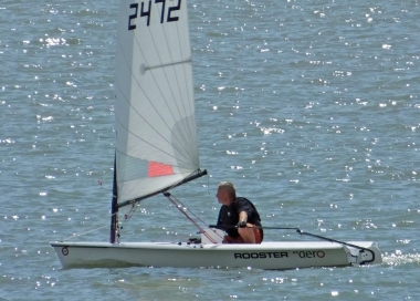 Brian Allen leads the fleet round the course