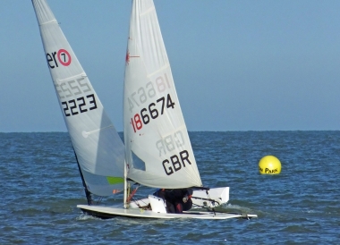 Dave Ingle's RS Aero passes Simon Kedge's Laser