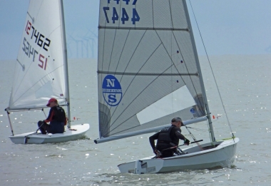 Paul Jackson's Solo about to overtake Gary Hollis in his Laser