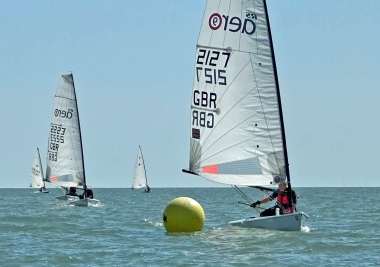 Tim Dye reaches to Lilley Farm buoy