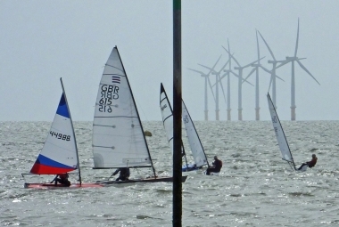 Ella Langfeldt, Tim Dye and Tom Bartlett tack out to sea whilst Simon Clarke and Finley Taylor remain parallel to the shore