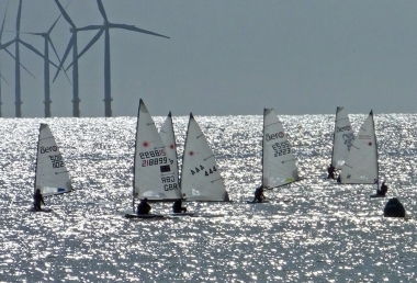 The Gunfleet Wind Farm acts as a backdrop on the run out to the Seaward buoy