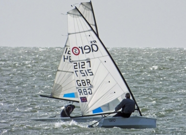 Tom Bartlett tacks quickly to avoid Tim Dye who is on starboard tack