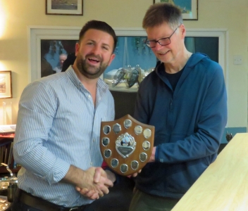 A delighted Tom Bartlett is presented with the Jim Suckling Long Distance Shield