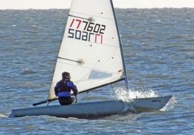 Adam Kedge drives his Laser into first place in the final Winter Series race