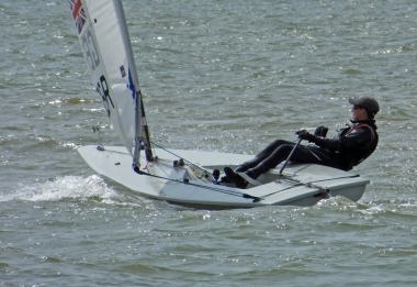 Leading for a while, Adam Kedge took his Laser Radial into third place