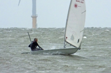 Jono Dunnett takes the second race in his Laser