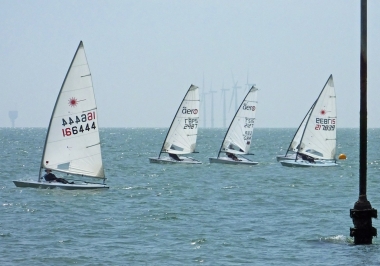 Jono Dunnett takes an immediate lead in his Laser at the very start
