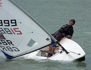 A sudden gust catches Simon Kedge's Laser